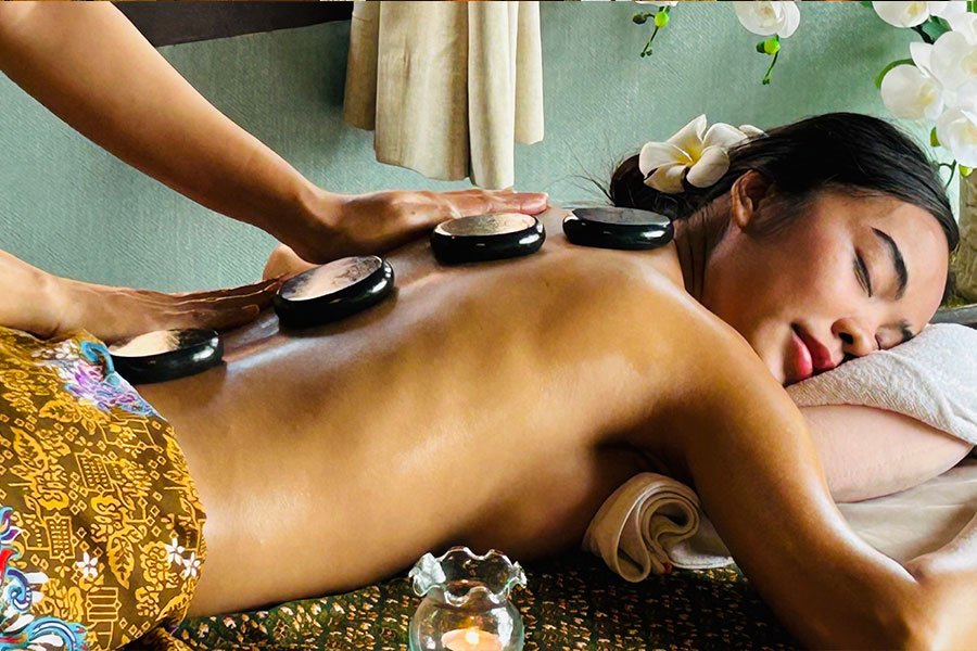 Anavana Massage & Welness Guest Enjoyinn a Relaxing Hot Stone Massage